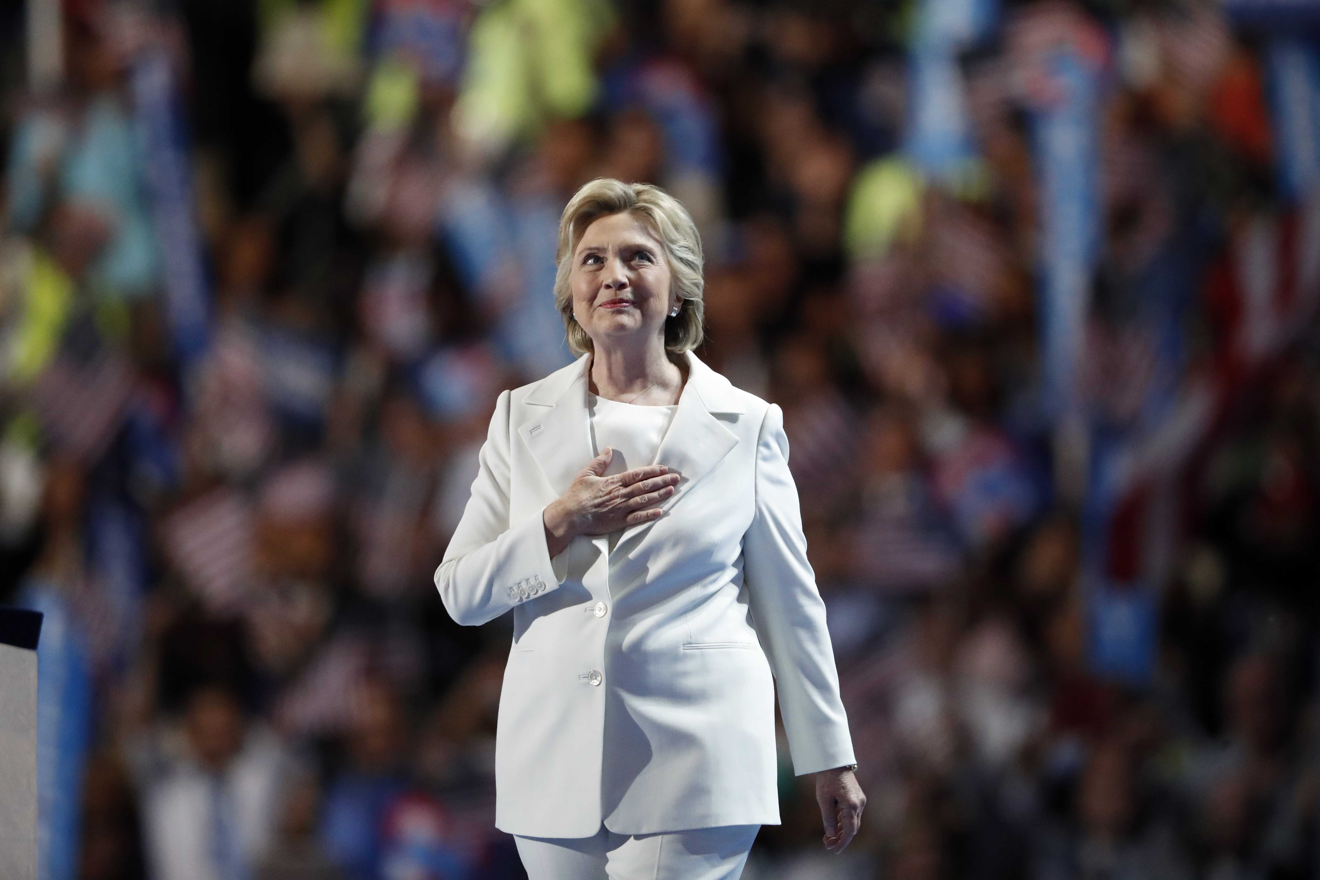 Democratic presidential nominee Hillary Clinton takes the stage to give her acceptance speech during the final day of the Democratic National Convention in Philadelphia , Thursday, July 28, 2016. (AP Photo/Paul Sancya)