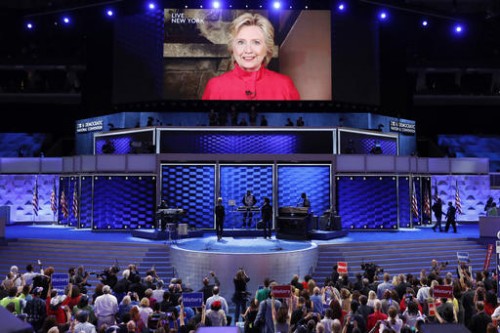 Democratic Presidential candidate Hillary Clinton appears on a large monitor to thank delegates during the second day of the Democratic National Convention in Philadelphia , Tuesday, July 26, 2016. (AP Photo/J. Scott Applewhite)