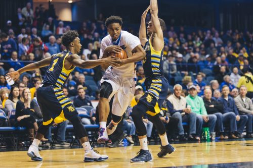 DePaul sophomore guard Eli Cain drives the ball through Marquette’s defense last season. (Photo by Josh Leff / The DePaulia)