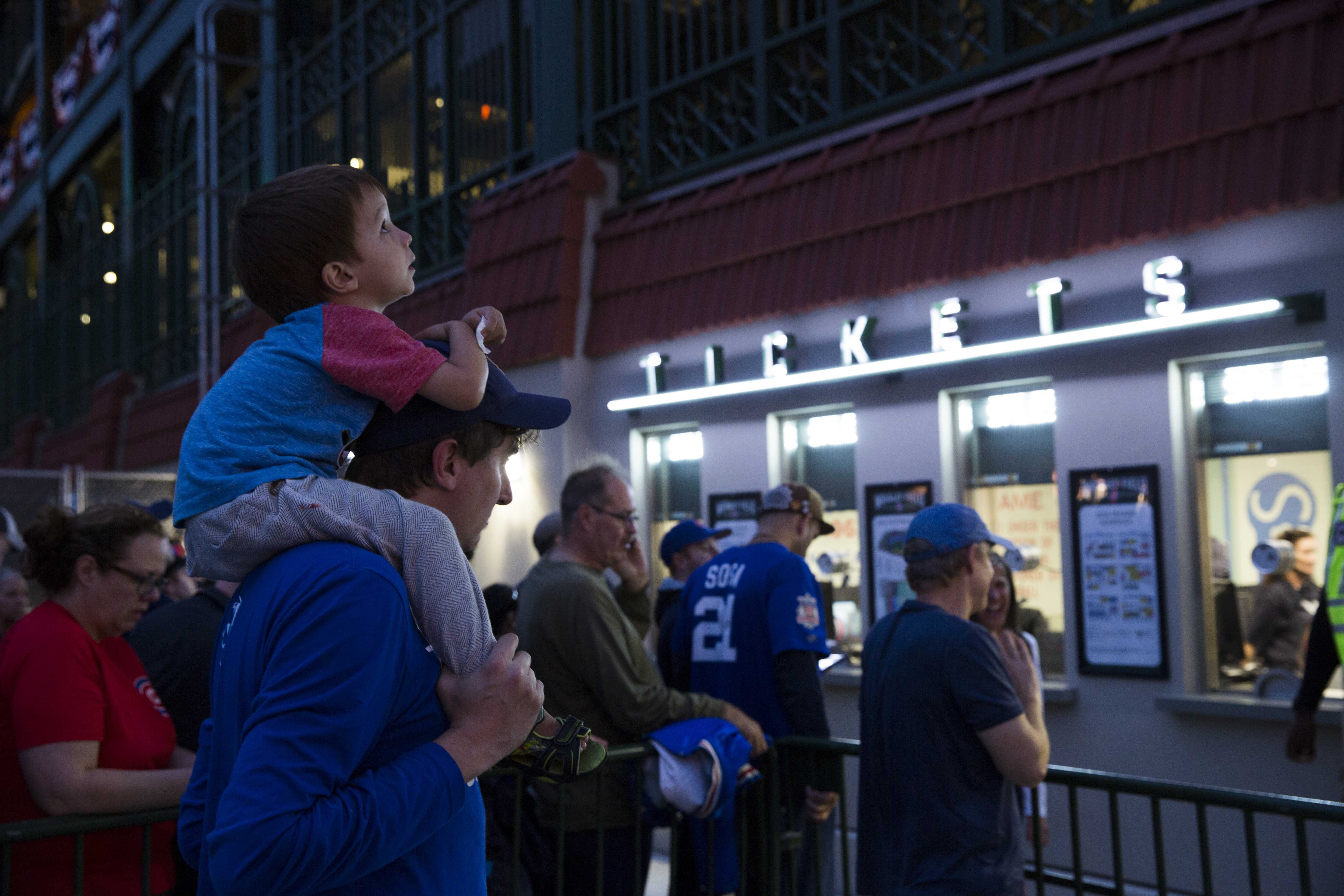 Though the Cubs lost last night, fans across multiple generations unite because of the team and their hope for the team (Geoff Stellfox | The DePaulia)