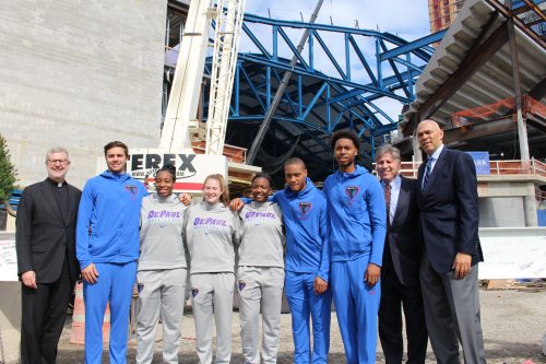 DePaul basketball players and coaches pose outside of the arena. (Jack Higgins/The DePaulia)
