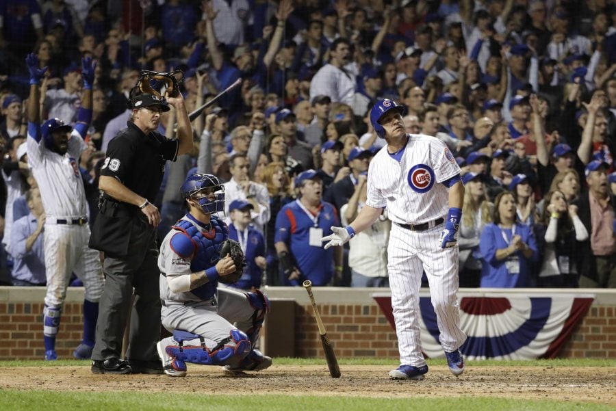 Chicago Cubs catcher Miguel Montero (47) watches the ball as he hits a grand slam during the eighth inning of Game 1 of the National League baseball championship series against the Los Angeles Dodgers Saturday, Oct. 15, 2016, in Chicago. (AP Photo/David J. Phillip)