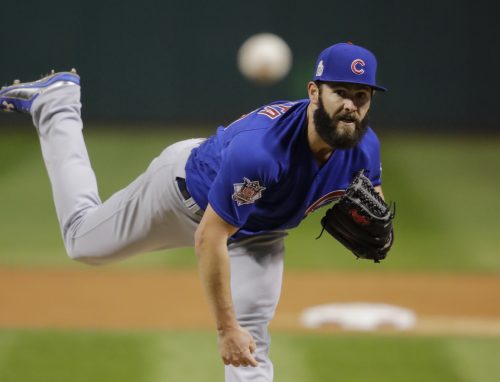 Chicago Cubs starting pitcher Jake Arrieta throws during the first inning of Game 2 of the Major League Baseball World Series against the Cleveland Indians Wednesday, Oct. 26, 2016, in Cleveland. (AP Photo/Gene J. Puskar)