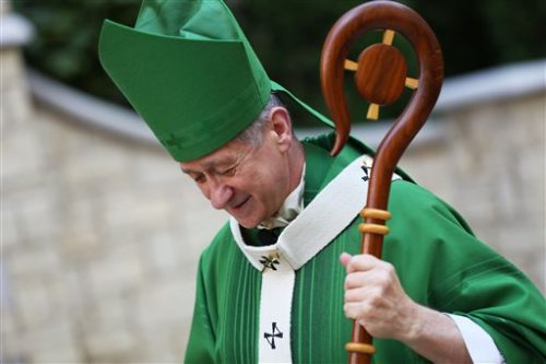 Archbishop Blase Cupich leaves a news conference following Mass Sunday, Oct. 9, 2016 at Holy Name Cathedral in Chicago. The Vatican announced Sunday that Chicago Archbishop Cupich will become cardinals in a Rome ceremony Nov. 19. Pope Francis named 17 new cardinals Sunday.(Chris Walker/Chicago Tribune via AP)