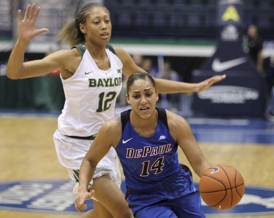 Former DePaul guard Jessica January (14) averaged 16.9 points, 6.6 rebounds and 4.2 assists for CSU Universitatea Alba Iulia in Romania.(AP Photo/Luis M. Alvarez)