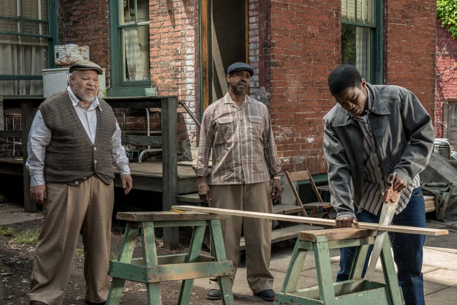 Denzel Washington (center) plays Troy Maxson, Stephen McKinley Henderson (left) plays Jim Bono and Jovan Adepo (right) plays Cory in the film Fences. Henderson and Adepo spoke to The DePaulia about their critically-acclaimed film. (David Lee |Paramount Pictures)