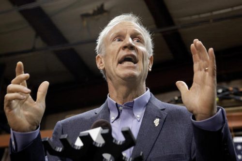 FILE - In this Nov. 16, 2016, file photo, Illinois Gov. Bruce Rauner speaks to reporters in Springfield, Ill. Rauner sent two clear signals when he dumped $50 million into his campaign fund: The 2018 race for Illinois governor will be a rough one, and the contest starts now. What's still unknown is which Democrats will try to unseat the multimillionaire former businessman. (AP Photo/Seth Perlman, File)