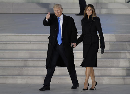 President-elect Donald Trump and his wife Melania Trump arrive at a pre-Inaugural Make America Great Again! Welcome Celebration at the Lincoln Memorial in Washington, Thursday, Jan. 19, 2017. (AP Photo/David J. Phillip)