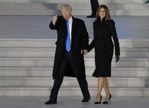 President-elect Donald Trump and his wife Melania Trump arrive at a pre-Inaugural "Make America Great Again! Welcome Celebration" at the Lincoln Memorial in Washington, Thursday, Jan. 19, 2017. (AP Photo/David J. Phillip)