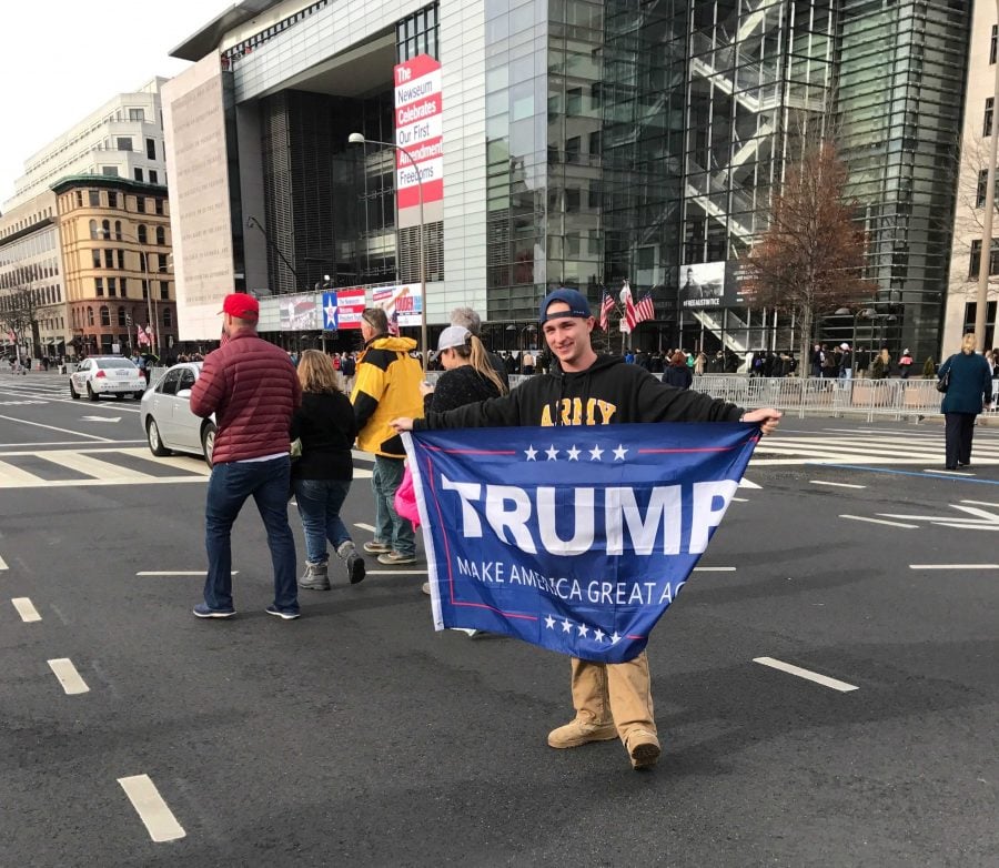 Eric Sullivan, a student at the University of Connecticut, proudly displays his pro-Trump flag. (Brenden Moore/The DePaulia) 