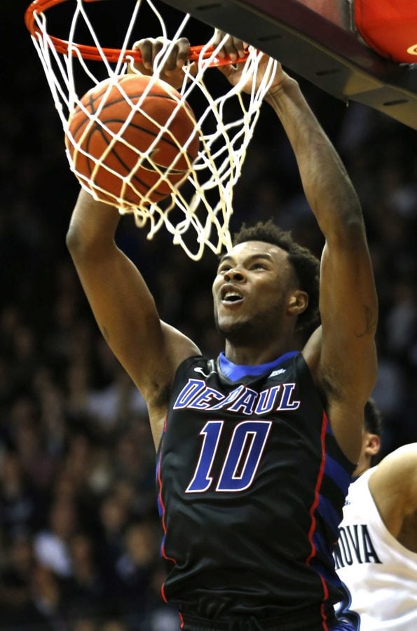 DePaul forward Tre'Darius McCallum (10) dunks during the second half of the team's NCAA college basketball game against Villanova, Wednesday, Dec. 28, 2016, in Villanova, Pa. Villanova won 68-65. (AP Photo/Laurence Kesterson)