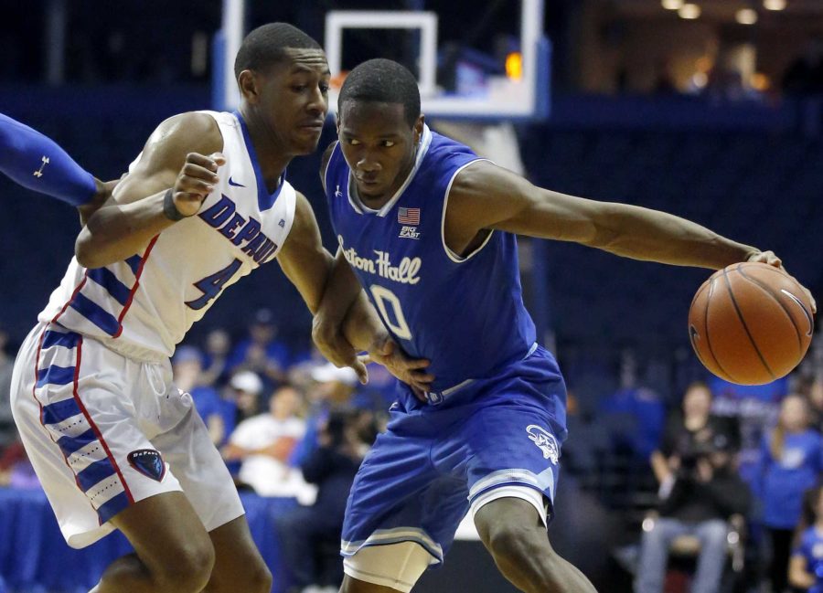 Seton Hall guard Khadeen Carrington, right, drives against DePaul guard Brandon Cyrus during the first half of an NCAA college basketball game Saturday, Feb. 25, 2017, in Rosemont, Ill. (AP Photo/Nam Y. Huh)