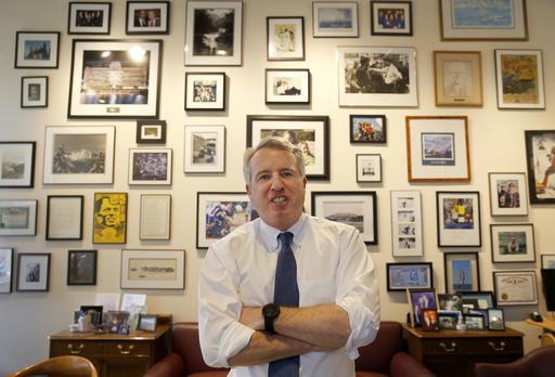 Chicago businessman Chris Kennedy, poses for a portrait in his office Wednesday, Feb. 8, 2017, in Chicago. Kennedy, the son of the late Sen. Robert F. Kennedy Jr., says he will run for Illinois governor in 2018. His bid brings the instant name recognition of his family's political legacy to what will likely be a sharply contested race to unseat Republican Gov. Bruce Rauner. (AP Photo/Charles Rex Arbogast)