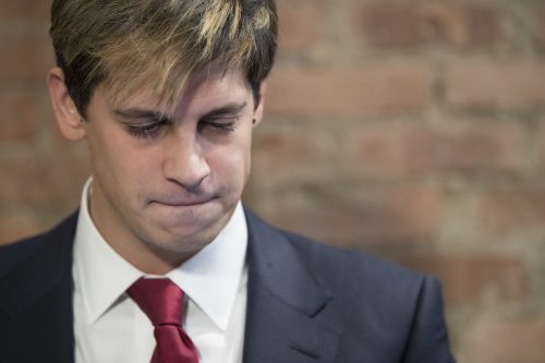 Milo Yiannopoulos speaks during a news conference, Tuesday, Feb. 21, 2017, in New York. Yiannopoulos has resigned as editor of Breitbart Tech after coming under fire from other conservatives over comments on sexual relationships between boys and older men. (AP Photo/Mary Altaffer)