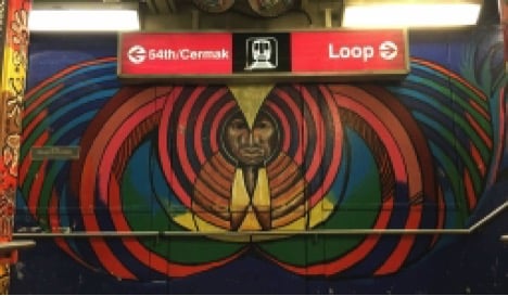 Aztec inspired art decorates the 18th street Pink line station.