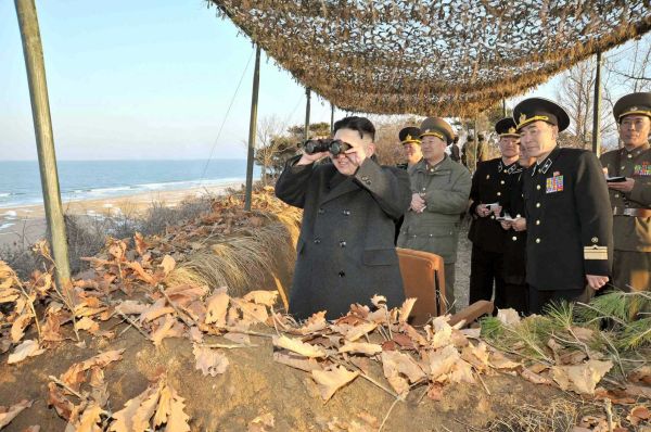 Chairman of the Workers' Party of Korea and leader of Democratic People's Republic of Korea, Kim Jong Un inspects the landing and anti-landing drills of the Korean People's Army Large Combined Units 324 and 287 and Navy Combined Unit 597 at a private location on one of North Korea's coasts. (Getty Images/AFP)