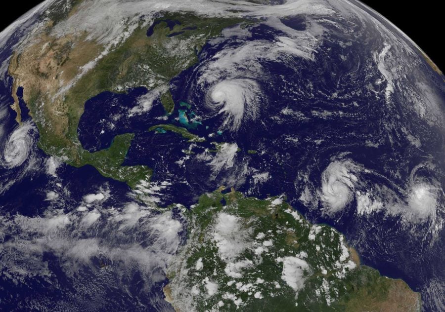 This image shows tropical weather systems Hurricane Norma, left, on the Pacific Ocean side of Mexico; Jose, center, east of Florida; Tropical Depression 15, second from right, north of South America, and Tropical Storm Lee, right, north of eastern Brazil, on Saturday, Sept. 16.
(NOAA-NASA GOES PROJECT, AP)