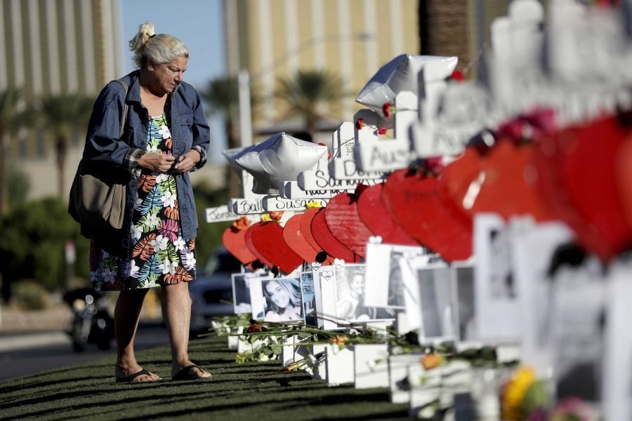 Nancy Hardy, of Las Vegas, cries as she walks among crosses placed in honor of those killed in the mass shooting in Las Vegas. (Gregory Bull/AP)