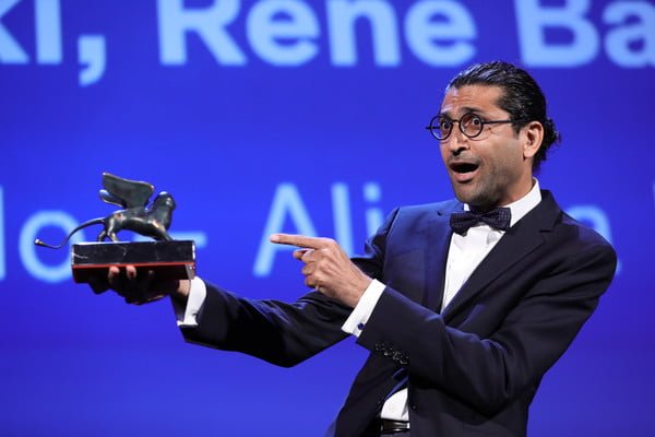 Alireza Khatami accepts his Orizzonti award at Venice Film Festival in September.  
(Photo courtesy of Vittorio Zunino Celotto)