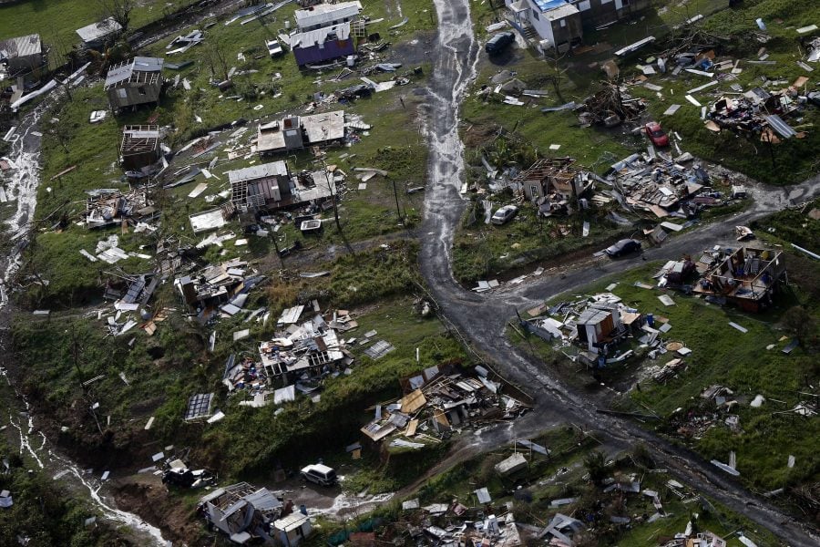 Debris scatters a destroyed community in the aftermath of Hurricane Maria in Toa Alta, Puerto Rico. (Gerald Herbert, AP)