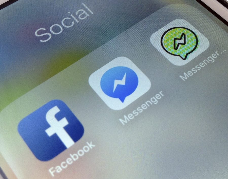 This photo shows application icons from left, Facebook, Facebook Messenger and Messenger Kids on an iPhone.(Photo courtesy of the Associated Press)