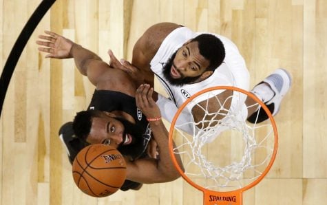 Two players, Team Stephens James Harden, left, from the Houston Rockets and Team LeBrons Andre Drummond form the Oklahoma City Thunder, go for a rebound in the second half of the NBA All-Star Game on Feb. 18. (Photo courtesy of AP Newsroom)