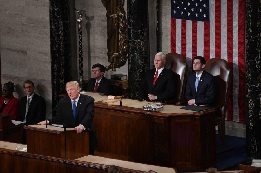President Donald Trump delivers his State of the Union address, and  Vice President Mike Pence and Speaker of the House of Representatives Paul Ryan sit behind him. (PHOTO COURTESY OF Tribune News Service)