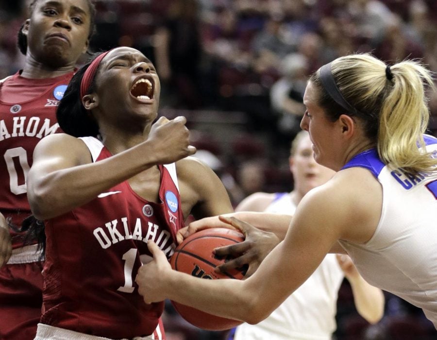DePaul limited LaNesia Williams (left) to 1-of-9 shooting and two points in the Blue Demons win over the Sooners.
David J. Phillip | AP
