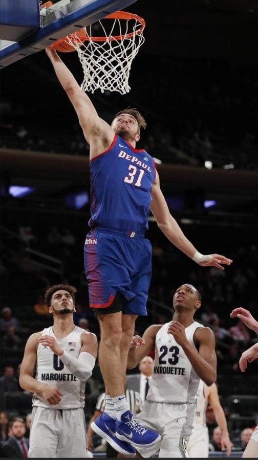 Junior guard Max Strus throws down a dunk in DePauls first round loss in the Big East Tournament at Madison Square Garden.

(Kathy Willens | AP)
 
