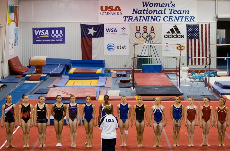 FILE - In this May 2008 file photo, gymnasts including Nastia Liukin, far left, and Shawn Johnson, far right, line up for Martha Karolyi during USA Gymnastics National Team training at the Karolyi Ranch, in Huntsville, Texas. 
(Smiley N. Pool/Houston Chronicle via AP, File)