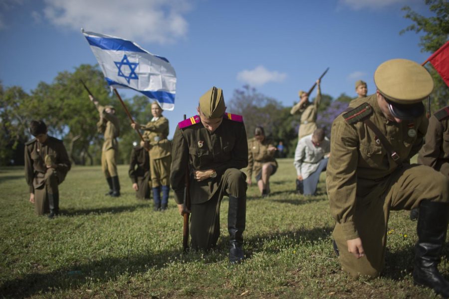 A World War II reenactment group celebrates Israel Victory Day in Ashdod, Israel on May 9, 2018