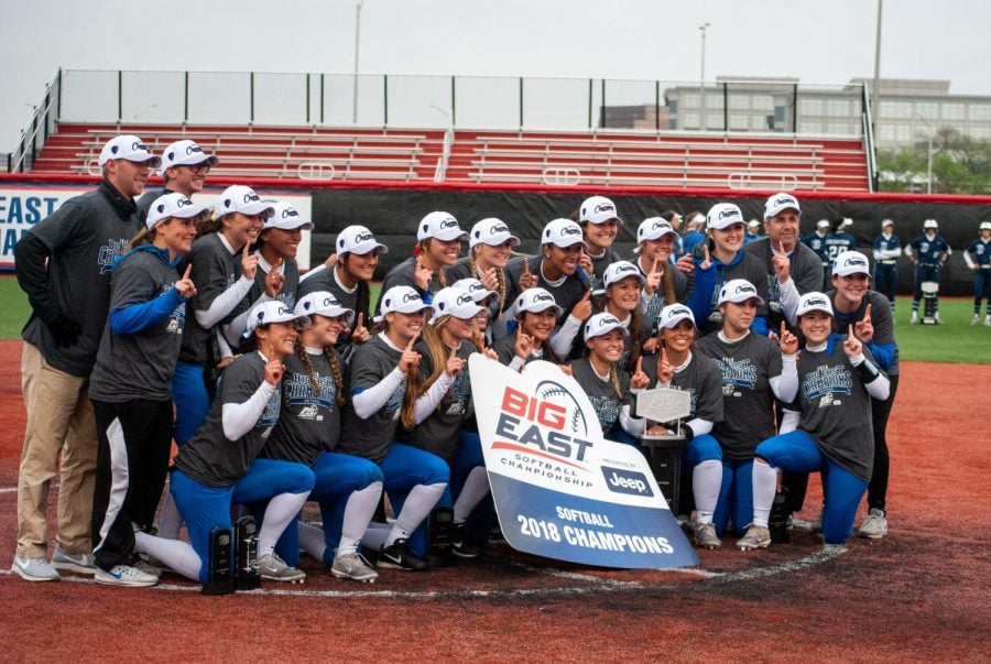 DePaul softball celebrates their 2018 Big East Tournament title. The Blue Demons won their third straight Big East Tournament title against Villanova on Saturday in Rosemont. 