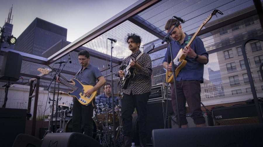 Five-piece band Books was one of four local bands that played amongst the skyscrapers leading up to the much anticipated artist reveal for this year's FEST.
(Photo courtesy of Matt Bordman)
