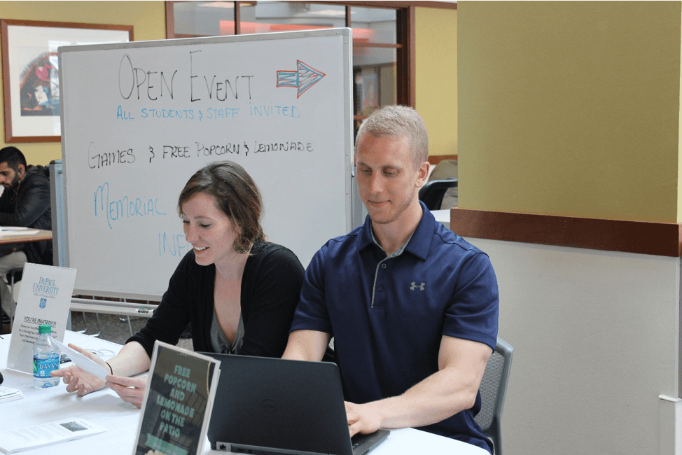 Veteran Liaisons, Bridget M. Keane (left) and Daniel Eggensammer (right), members of the Office of Veteran Affairs, working the Memorial Day informational and games event.