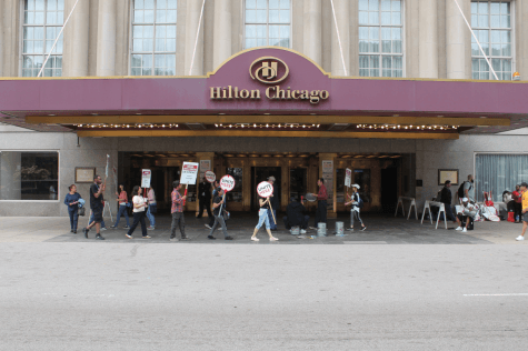 Hotel workers beat the drum for healthcare as others return to work