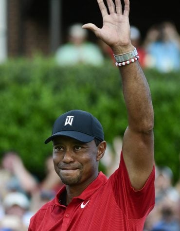 Woods inspires youth again with win