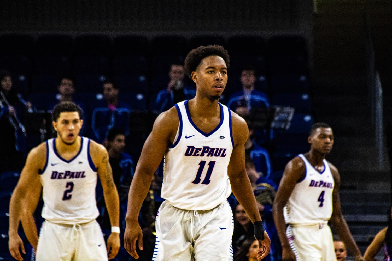 DePaul senior Eli Cain flanked by sophomores Jaylen Butz and Paul Reed get ready for a defensive possession against Rockhurst on Thursday night.
Richard Bodee | The DePaulia