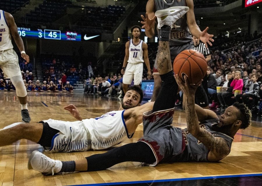 Senior guard Max Strus dives for a loose ball during the second half of DePaul's loss to Boston College. Richard Bodee | The DePaulia