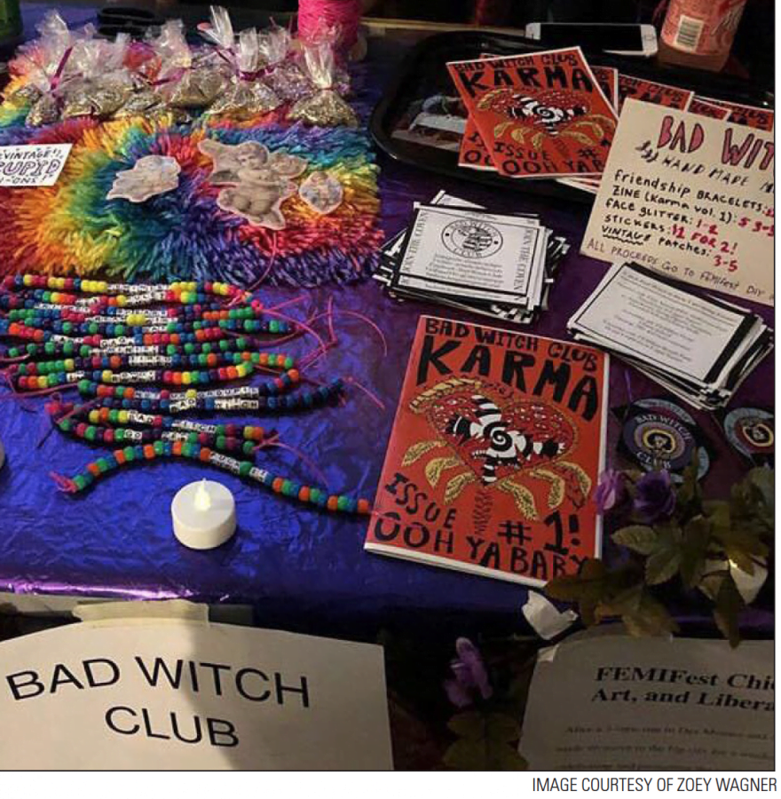 A stand of Bad Witch Club memorabilia at the goth prom fundraiser.