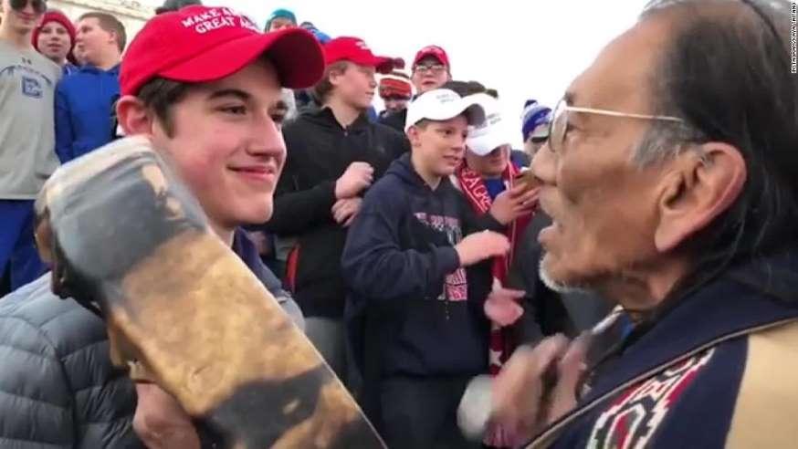 Covington Catholic High School student Nick Sandmann, left, and Native American activist Nathan Phillips confront each other after the March for Life on the National Mall in Washington, D.C., Friday, Jan. 18. After video of the incident went viral, Covington Catholic temporarily shut its doors Tuesday.