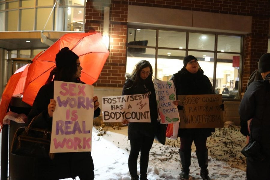 Current and former sex workers and supporters of the profession stand outside the Lincoln Park Student Center in protest on Wednesday of XXX: Love and Life in a Post-Porn World.