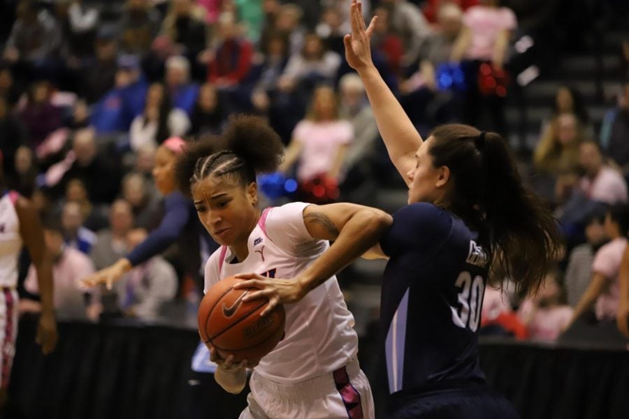 Marte Grays fights for position in the post against Villanova junior forward Mary Gedaka on Friday night at McGrath-Phillips Arena. Alexa Sandler |  The DePaulia