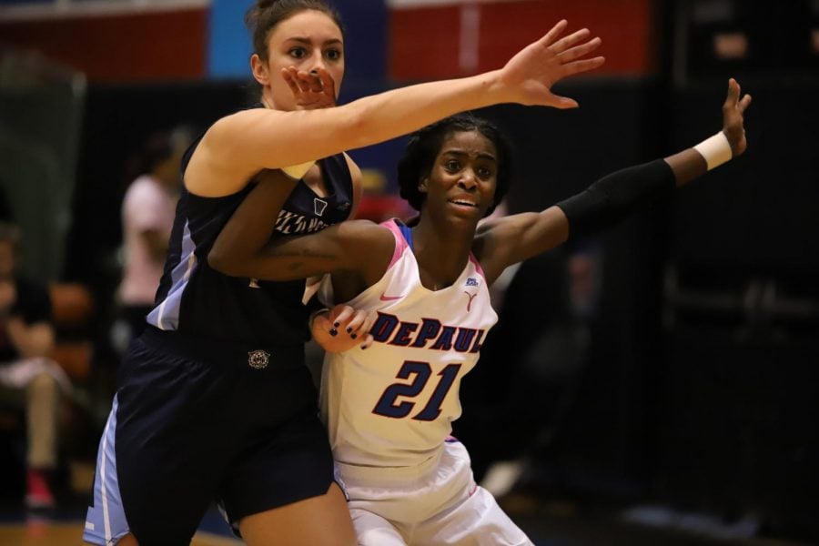 Senior forward Chante Stonewall fights for position in the post against a Villanova defender. Stonewall finished with 20 points against the Wildcats. Alexa Sandler | The DePaulia