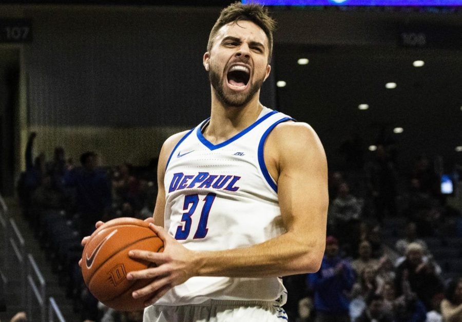 Senior guard Max Strus celebrates a 3-point play late in the game that helped DePaul seal the win Saturday at Wintrust Arena.Richard Bodee | The DePaulia