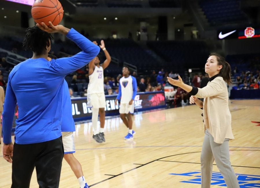 DePaul+senior+Maya+Scanlon-Kimura+asks+for+the+basketball+from+sophomore+forward+Darious+Hall+during+warmups+prior+to+a+Nov.+7+game+against+Bethune-Cookman.