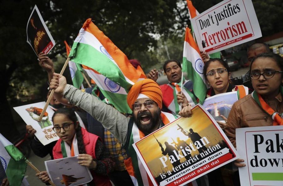 A National Akali Dal leader shouts slogans in support of India and against Pakistan as he celebrates reports of Indian aircrafts bombing Pakistan territory, in New Delhi, India, Tuesday, Feb. 26, 2019. 