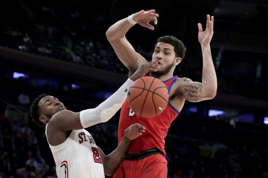 Sophomore forward Jaylen Butz loses the ball going up for a shot against St. Johns guard Shamorie Ponds during the second half of the Big East mens tournament in New York. St. Johns won the game 82-74. Julio Cortez | AP