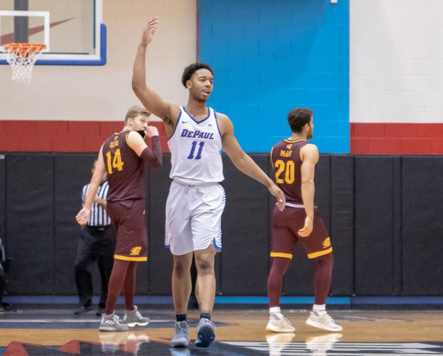 Senior guard Eli Cain pumps up the crowd during DePaul's win over Central Michigan Wednesday night at McGrath-Phillips Arena. Jonathan Aguilar | The DePaulia