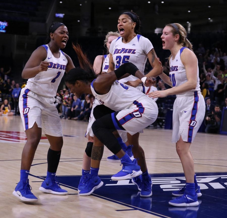 DePaul junior Chante Stonewall and teammates react after an and-one call with five seconds left in the title game against Marquette. Stonewall made the free throw to give her team a 74-73 victory. Alexa Sandler | The DePaulia