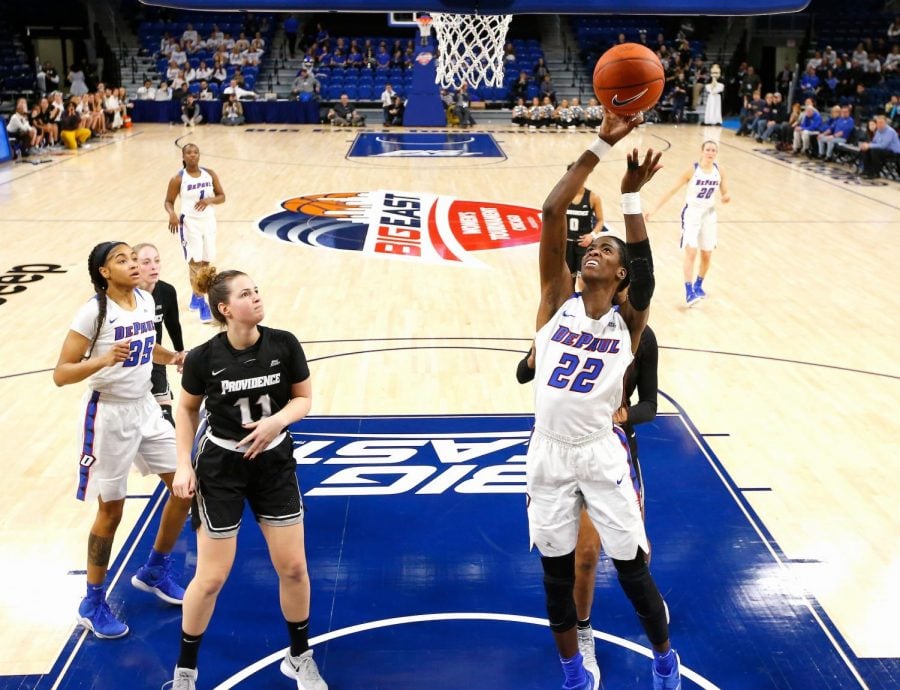 DePaul junior forward Chante Stonewall attempts a layup during the Blue Demons win over Providence Sunday night in the quarterfinals of the Big East Tournament. Stonewall finished with nine points. Steve Woltmann/BIG EAST